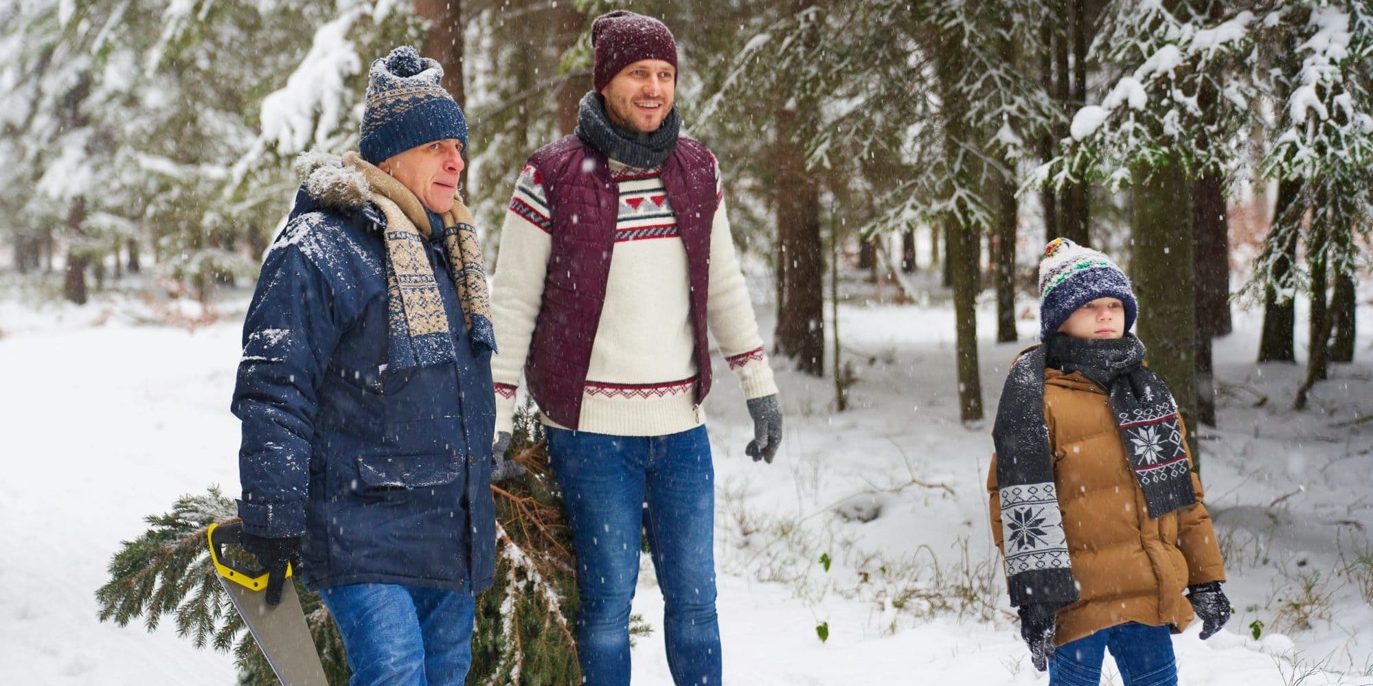 Three generation of family looking for perfect Christmas tree